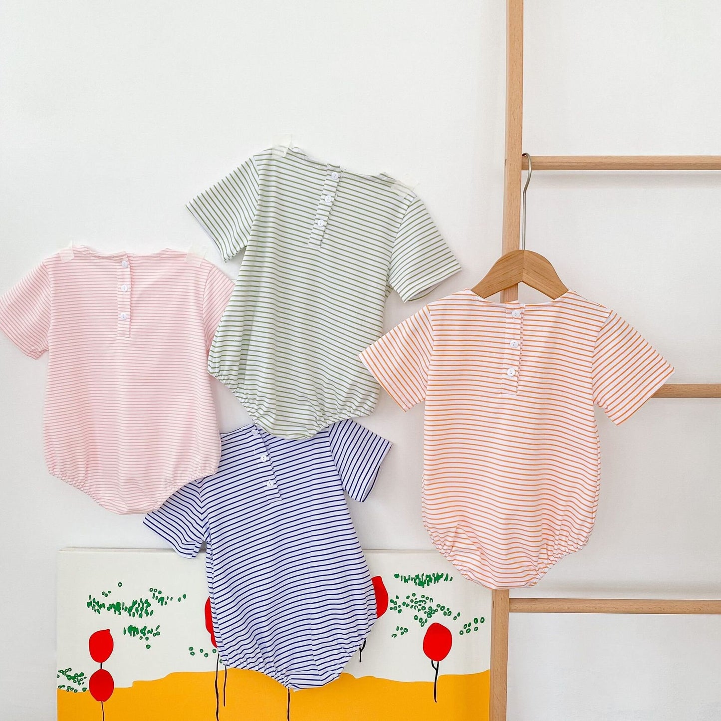Cute oversized, bubble striped baby romper for summer/spring. Unisex, gender neutral perfect baby shower gift