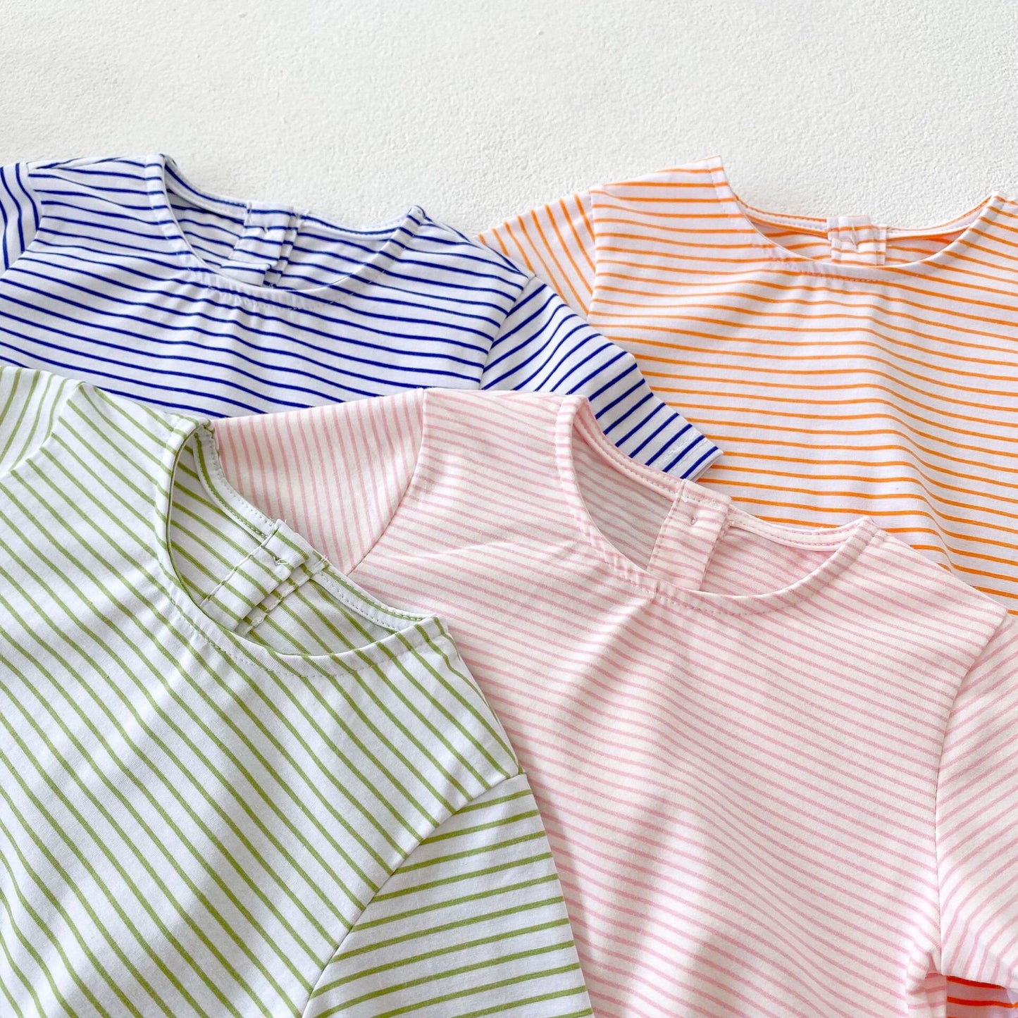 Cute oversized, bubble striped baby romper for summer/spring. Unisex, gender neutral perfect baby shower gift