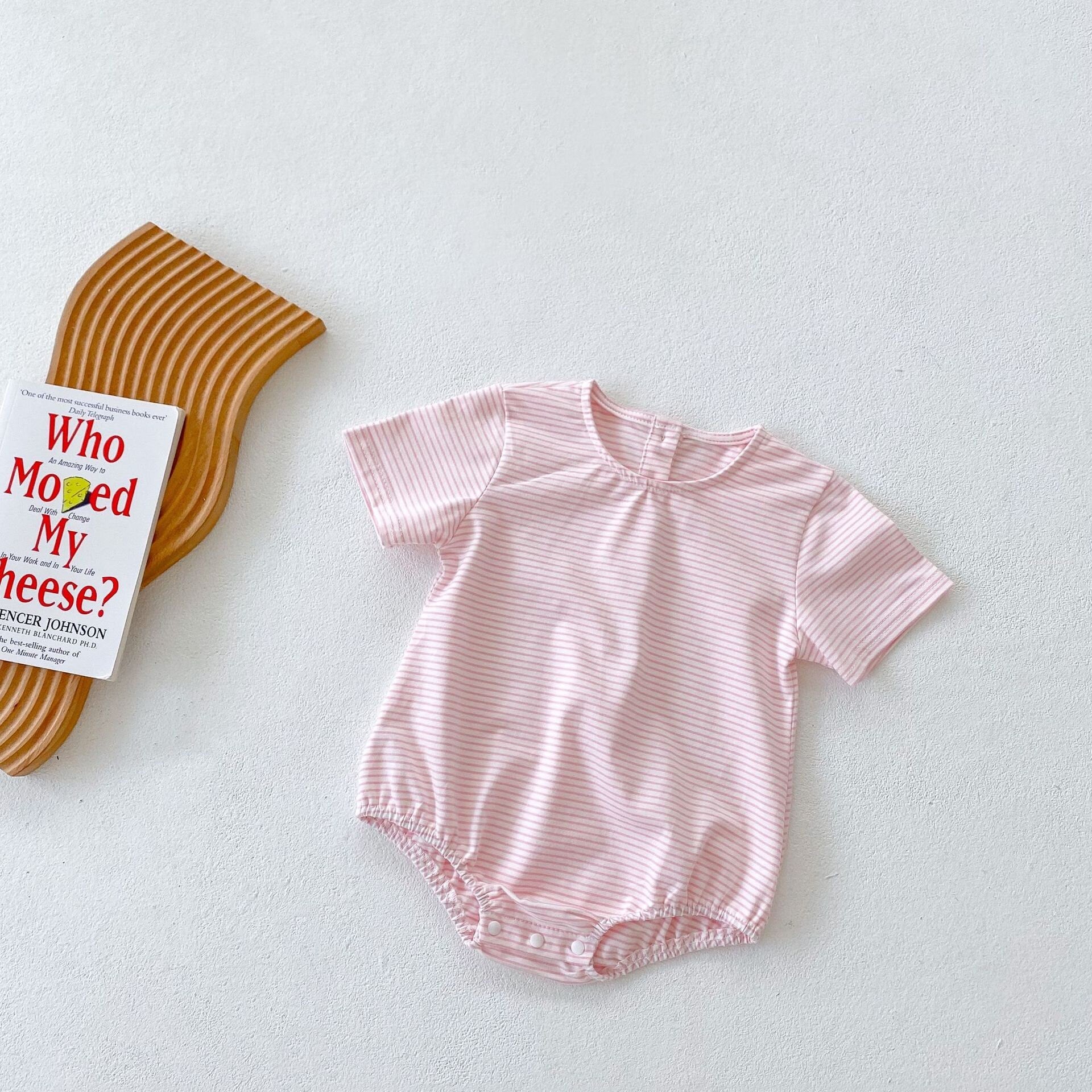 Cute oversized, bubble striped baby romper for summer/spring. Unisex, gender neutral perfect baby shower gift