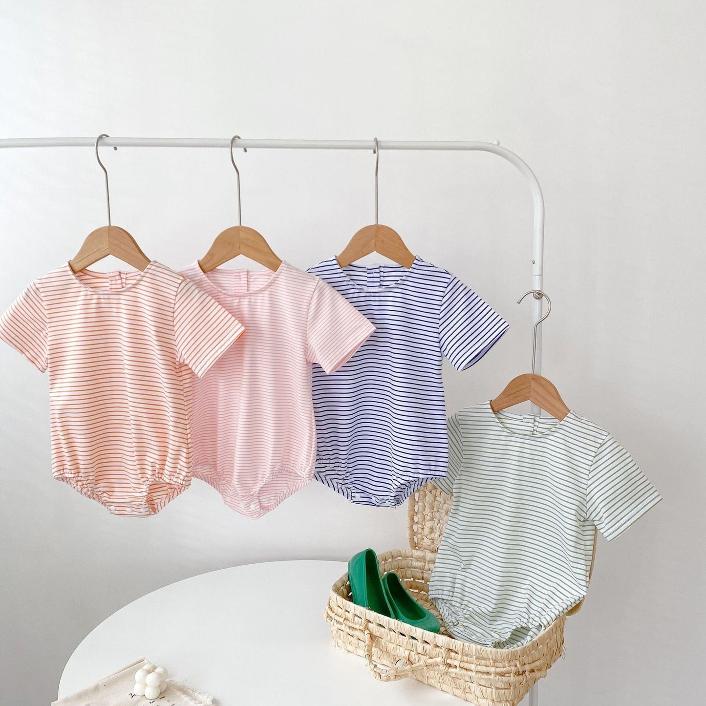 Cute oversized, bubble striped baby romper for summer/spring. Unisex, gender neutral perfect baby shower gift