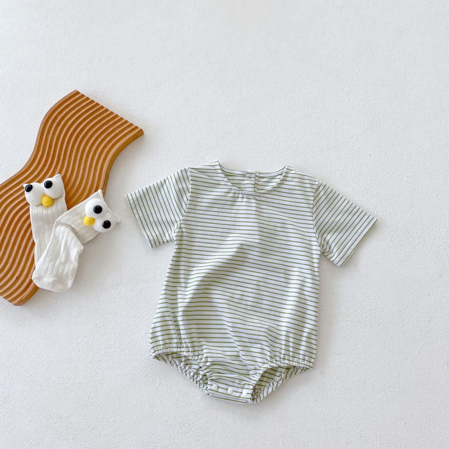 Cute oversized, bubble striped baby romper for summer/spring. Unisex, gender neutral perfect baby shower gift